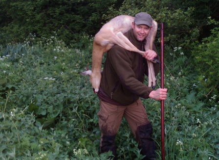 Happy hunter with the Forester's rifle stick!